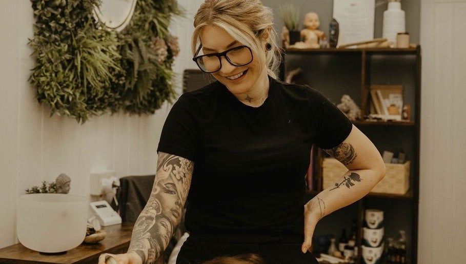 Amiee working with a client at The Sage Clinic